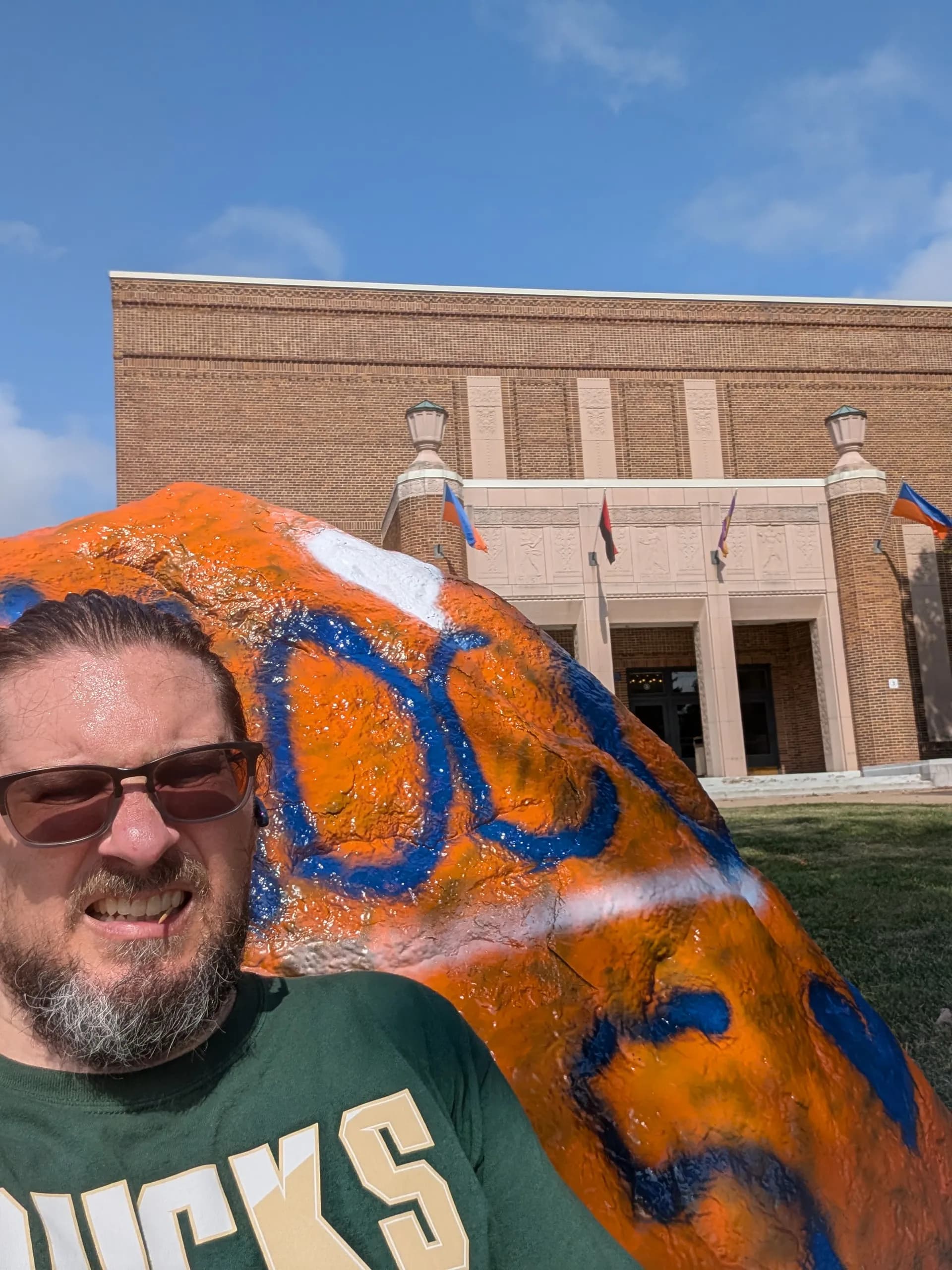 Appleton West rock wall postcard with blue accents