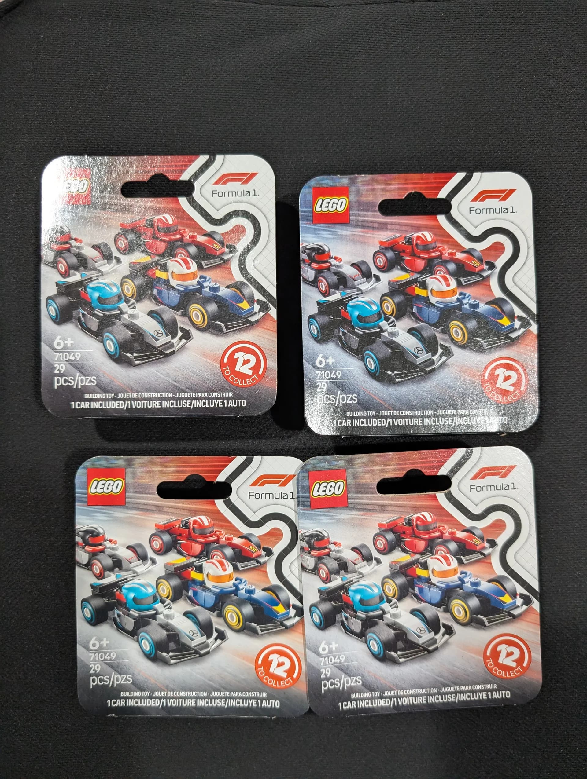 LEGO Formula One car kit posed on a reflective surface