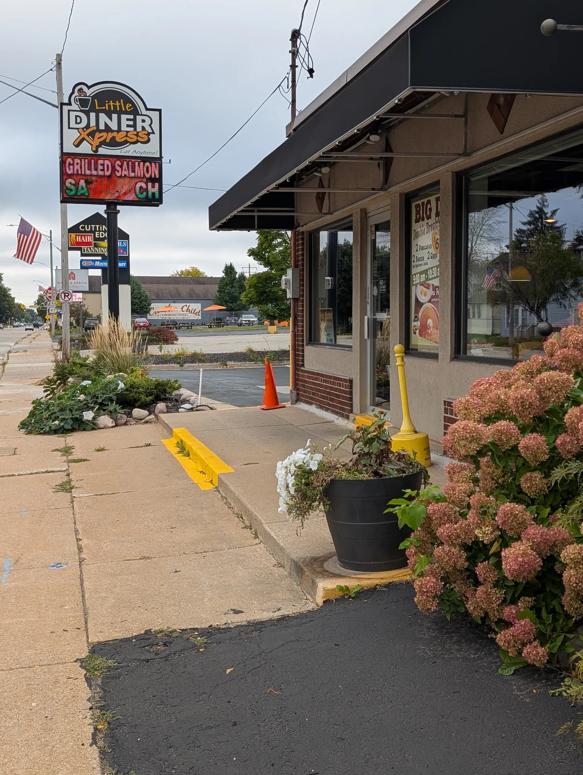 Little Diner Xpress postcard with playful signage