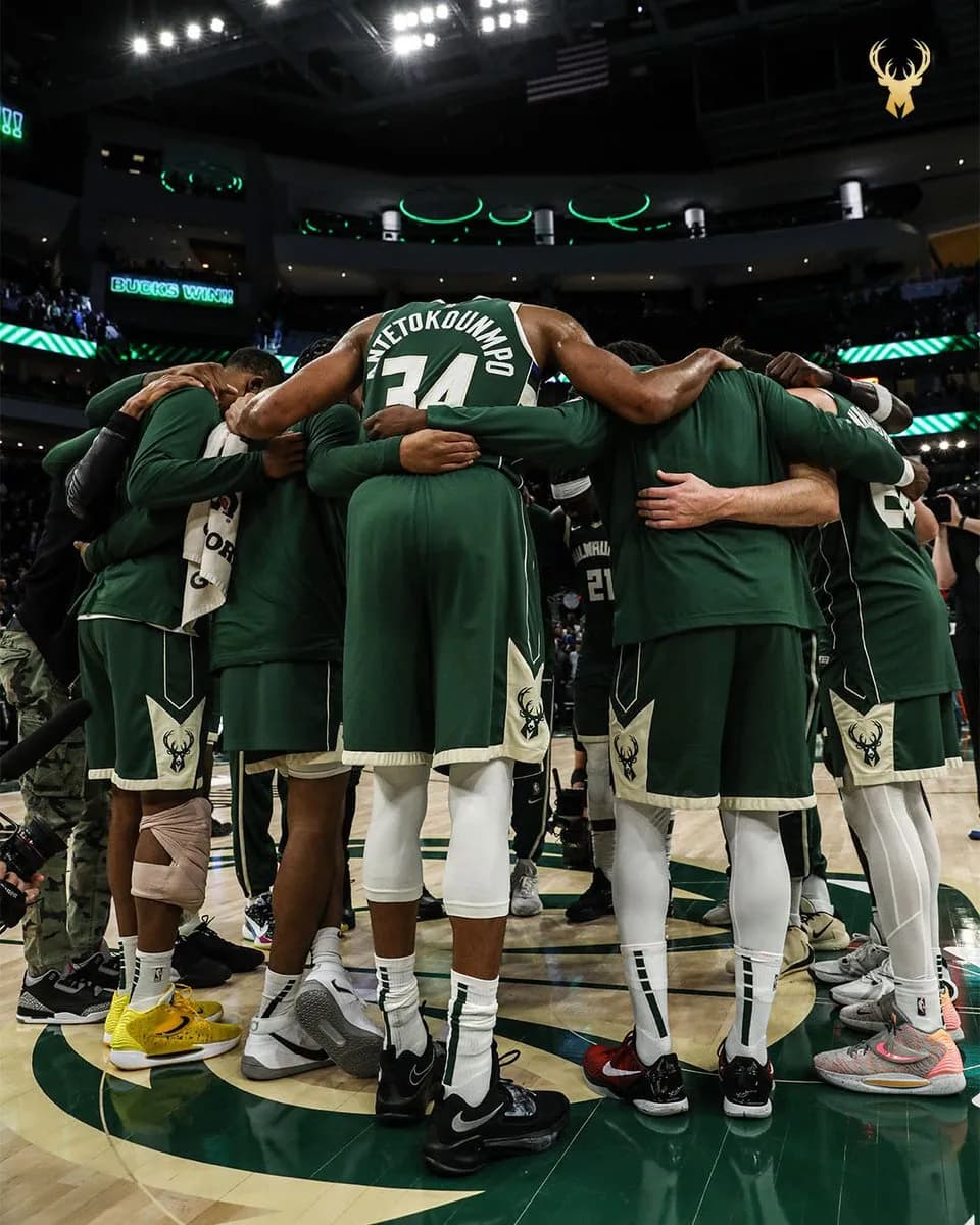 Milwaukee Bucks hug ball