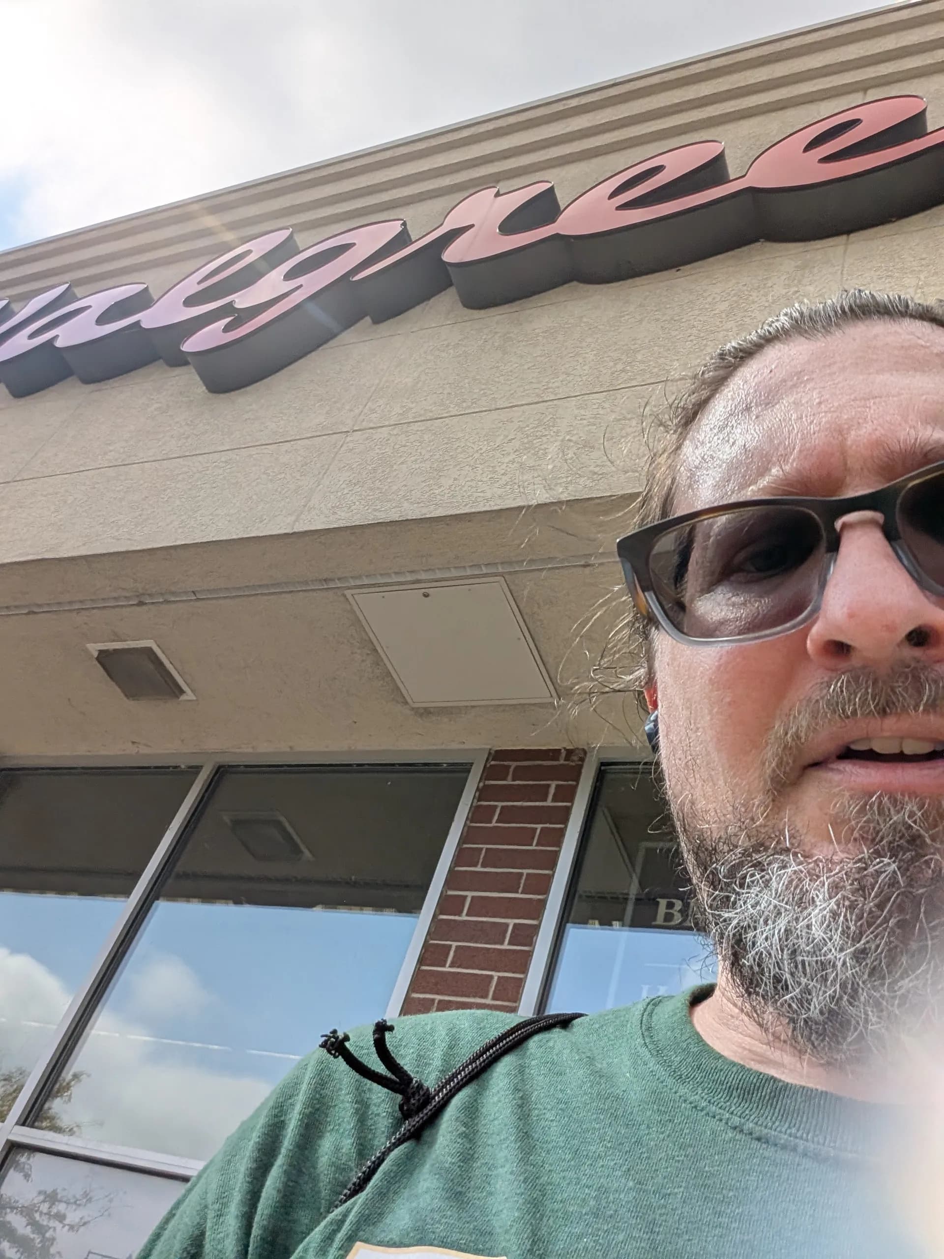 Walgreens storefront rendered with soft gradients